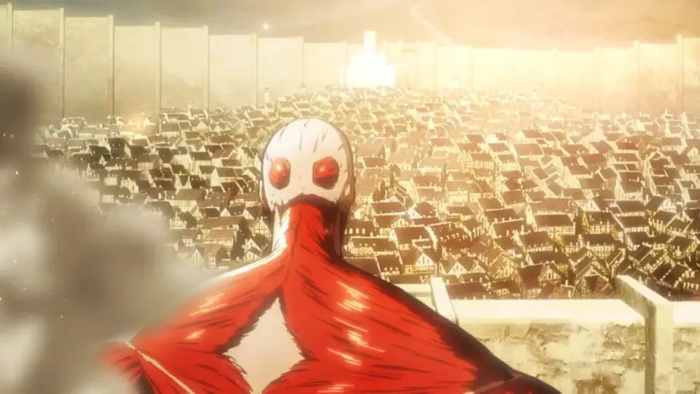 Colossal Titan looming over Shiganshina All About Rod Reiss From Attack on Titan